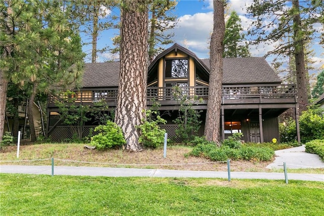 361 Riviera Dr, Lake Arrowhead, CA 92352 - view of front of property featuring a wooden deck, roof with shingles, and a front yard
