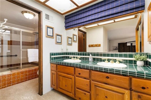 361 Riviera Dr, Lake Arrowhead, CA 92352 - bathroom featuring double vanity and tiled shower