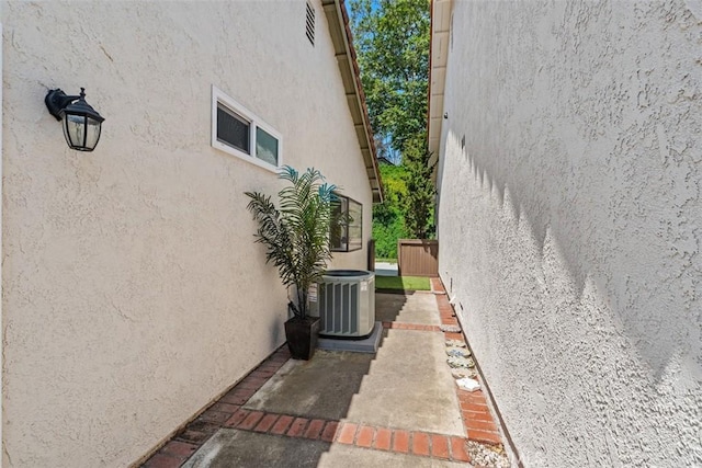 28205 Zurburan, Mission Viejo, CA 92692 - view of side of property featuring a central air condition unit and stucco siding