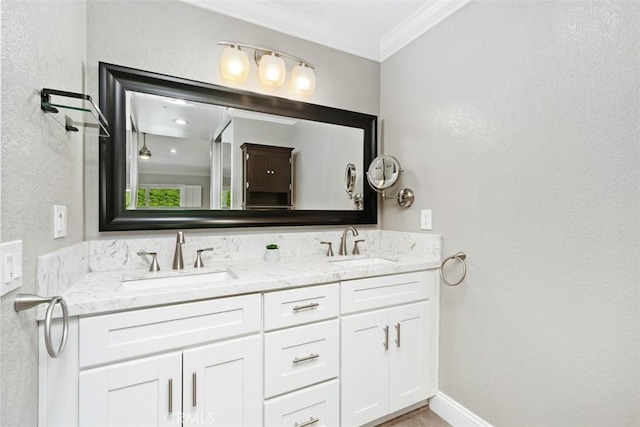 28205 Zurburan, Mission Viejo, CA 92692 - full bathroom with crown molding, double vanity, and a textured wall