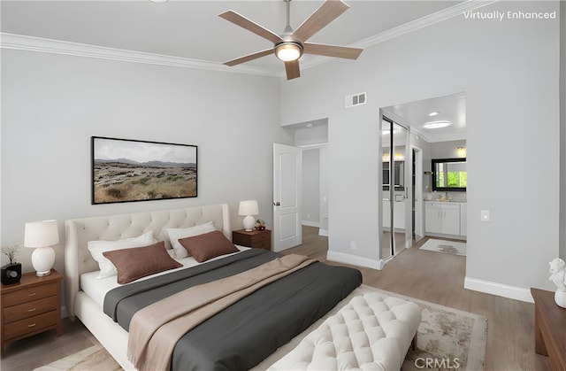 28205 Zurburan, Mission Viejo, CA 92692 - bedroom with ornamental molding, wood finished floors, connected bathroom, and lofted ceiling