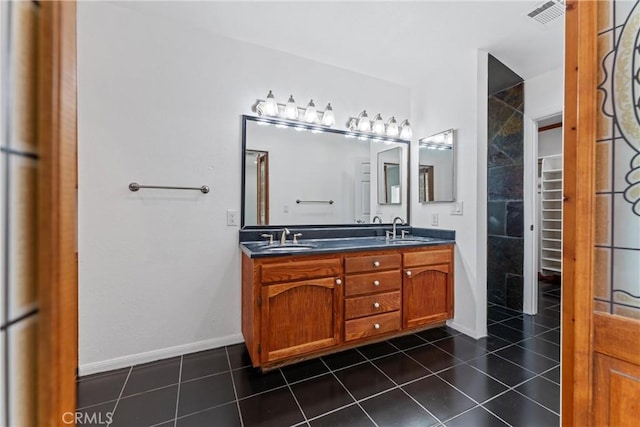 41127 17th St W, Palmdale, CA 93551 - full bath with double vanity and tile patterned flooring
