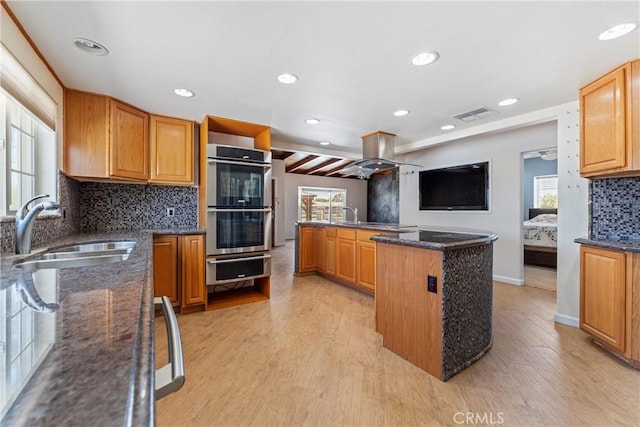 41127 17th St W, Palmdale, CA 93551 - kitchen with double oven, a warming drawer, plenty of natural light, tasteful backsplash, and recessed lighting