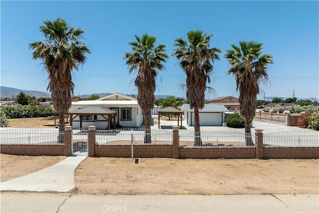 41127 17th St W, Palmdale, CA 93551 - view of front facade with a gazebo and a fenced front yard