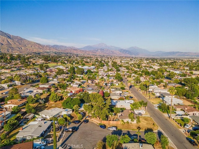 26919 Villa Ave, Highland, CA 92346 - aerial view of property and surrounding area featuring mountains and nearby suburban area