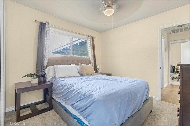 26919 Villa Ave, Highland, CA 92346 - carpeted bedroom featuring baseboards and a ceiling fan