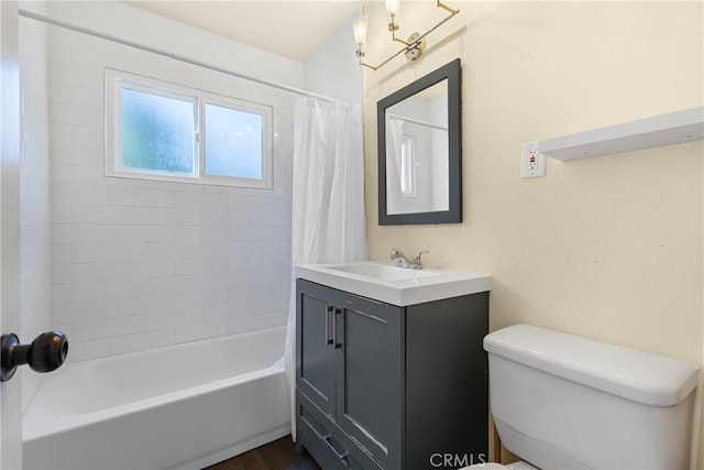 26919 Villa Ave, Highland, CA 92346 - full bath featuring vanity, shower / bath combo, and wood finished floors