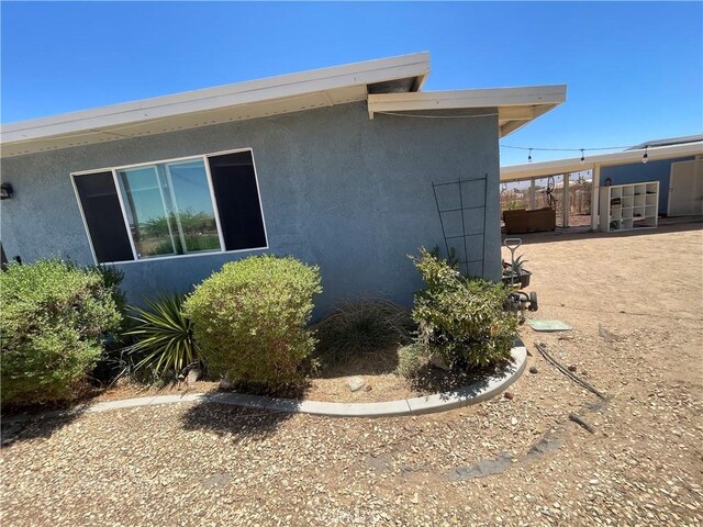10623 4th Ave, Hesperia, CA 92345 - view of property exterior featuring stucco siding