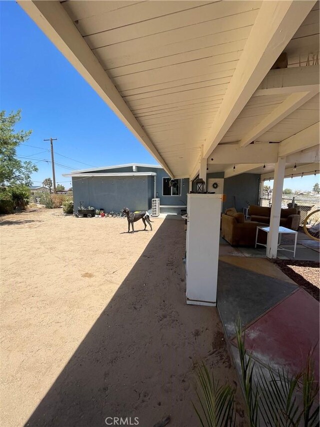 10623 4th Ave, Hesperia, CA 92345 - view of yard featuring a patio area