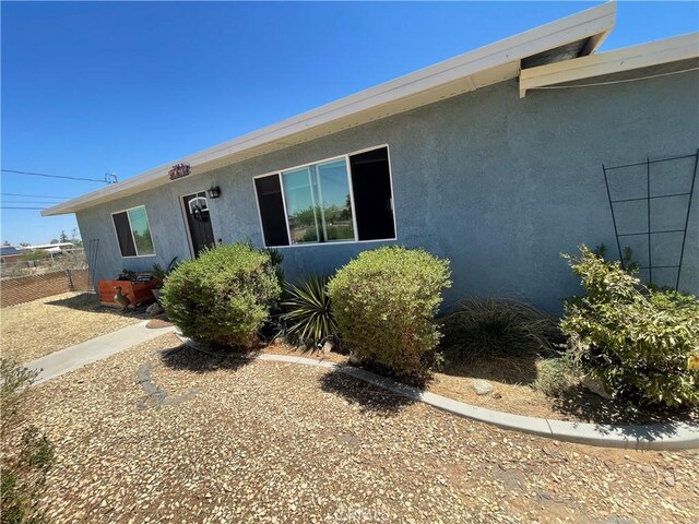 10623 4th Ave, Hesperia, CA 92345 - view of front of property featuring stucco siding