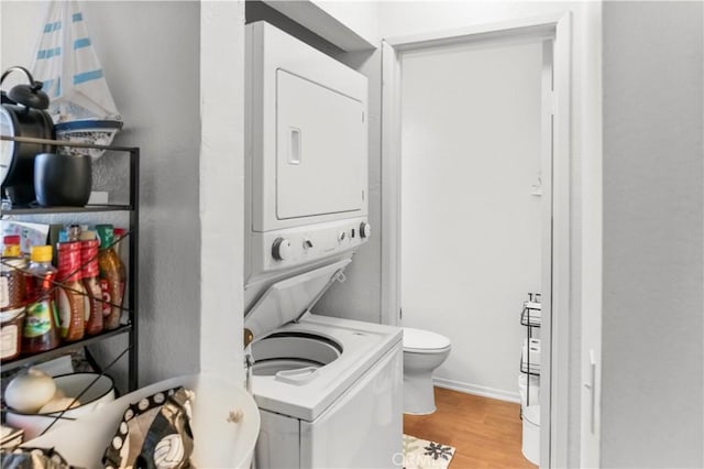 1726 W 150th St Unit 1, Gardena, CA 90247 - laundry area with stacked washer and clothes dryer and light wood finished floors