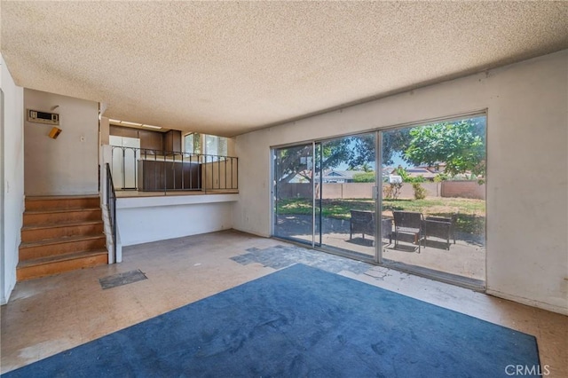 17300 Buttonwood St, Fountain Valley, CA 92708 - unfurnished living room with a textured ceiling and stairway