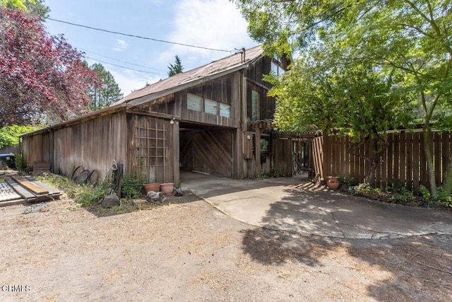 31351 Comptche Ukiah Rd, Comptche, CA 95427 - view of side of property featuring driveway, an outdoor structure, and a garage