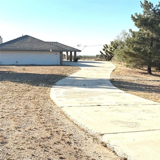9078 Smith Rd, Phelan, CA 92371 - view of side of home with driveway