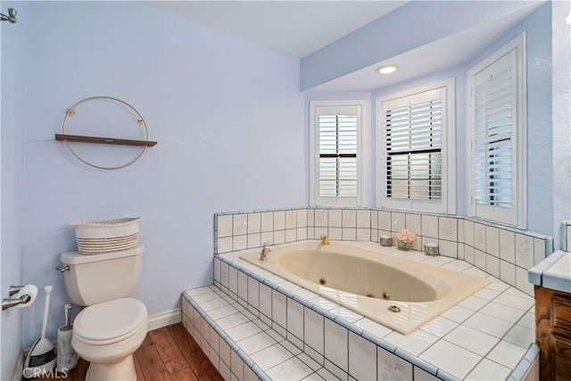 5908 Alleppo Ln, Palmdale, CA 93551 - full bath with a whirlpool tub and wood finished floors