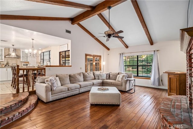 5908 Alleppo Ln, Palmdale, CA 93551 - living area featuring a ceiling fan, a chandelier, and hardwood / wood-style flooring