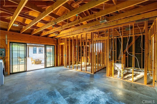 5908 Alleppo Ln, Palmdale, CA 93551 - misc room with unfinished concrete floors and washer / dryer