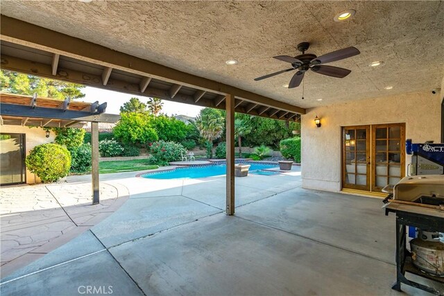 5908 Alleppo Ln, Palmdale, CA 93551 - outdoor pool with french doors, ceiling fan, a patio area, and grilling area