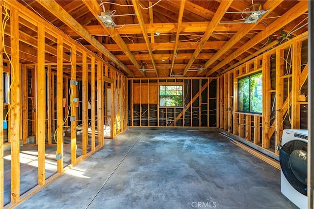 5908 Alleppo Ln, Palmdale, CA 93551 - miscellaneous room featuring washer / clothes dryer and concrete flooring