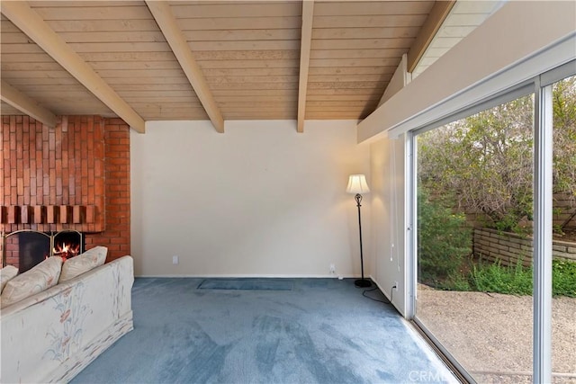 10 Mann St, Irvine, CA 92612 - unfurnished living room with healthy amount of natural light, carpet flooring, a wooden ceiling with exposed beams, and a brick fireplace