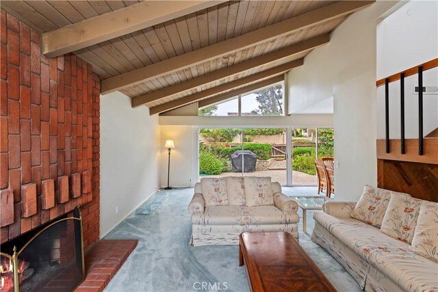 10 Mann St, Irvine, CA 92612 - living area featuring carpet flooring, wood ceiling, and a brick fireplace