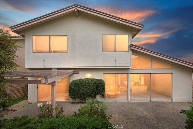 10 Mann St, Irvine, CA 92612 - back of house with a patio area and stucco siding