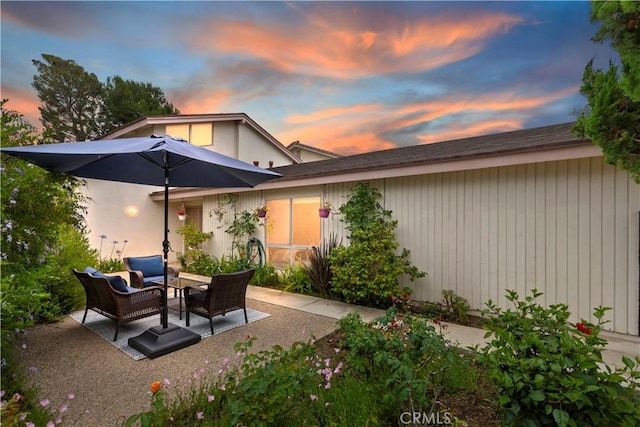 10 Mann St, Irvine, CA 92612 - rear view of property with a patio area and an outdoor living space