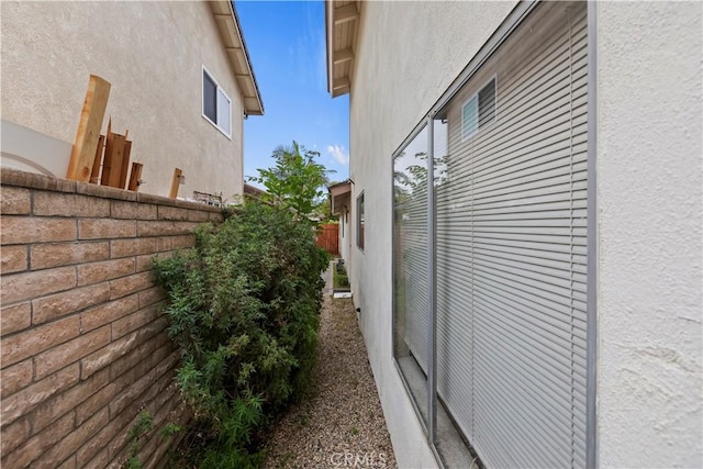 10 Mann St, Irvine, CA 92612 - view of side of property featuring stucco siding