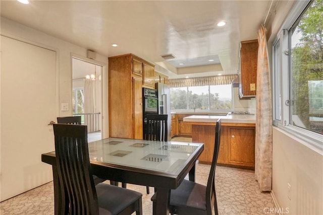 19291 Berclair Ln, Tarzana, CA 91356 - dining room featuring recessed lighting