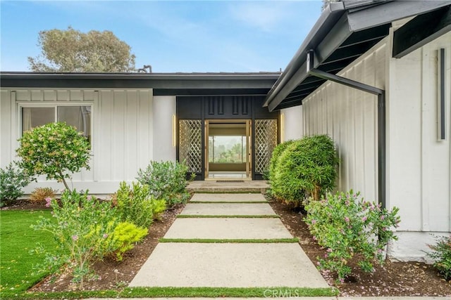 19291 Berclair Ln, Tarzana, CA 91356 - doorway to property with board and batten siding