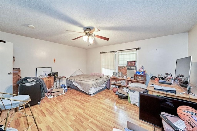 3744 Myrtle Ave, Long Beach, CA 90807 - bedroom featuring wood finished floors, a textured ceiling, and ceiling fan