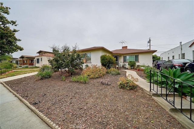 3744 Myrtle Ave, Long Beach, CA 90807 - view of front of house featuring stucco siding and a chimney