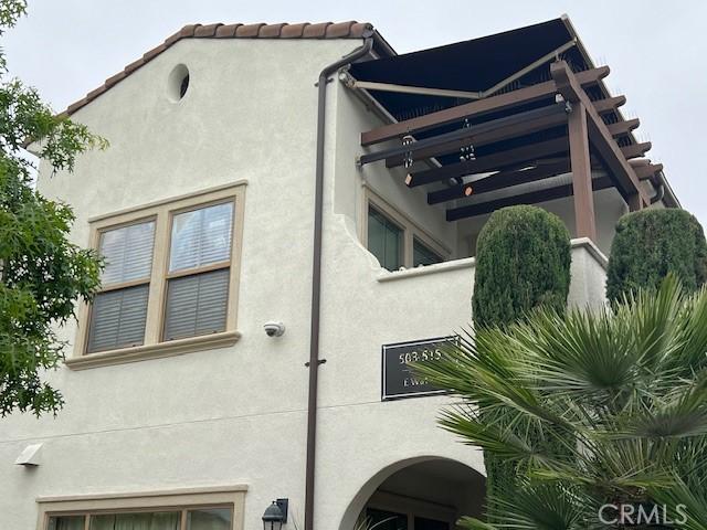 513 E Water St, Anaheim, CA 92805 - view of home's exterior with stucco siding