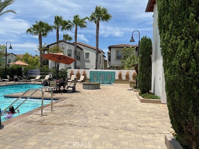 513 E Water St, Anaheim, CA 92805 - community pool featuring a patio area and an outdoor fire pit