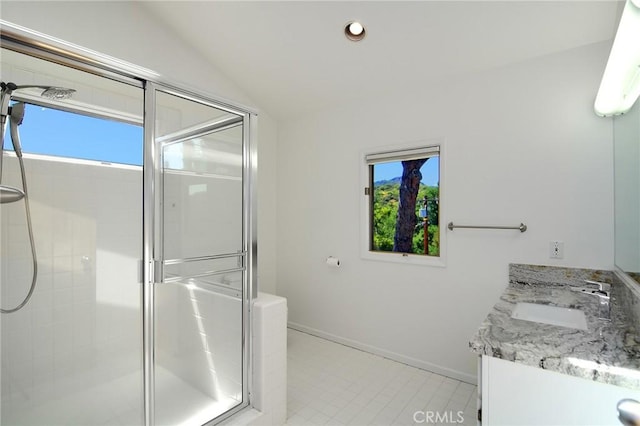 828 Wonder View Dr, Calabasas, CA 91302 - full bath featuring a stall shower, vaulted ceiling, double vanity, tile patterned floors, and recessed lighting