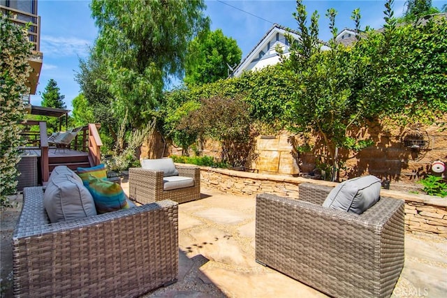 828 Wonder View Dr, Calabasas, CA 91302 - view of patio with an outdoor hangout area and a hot tub