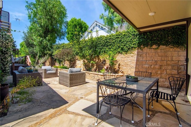 828 Wonder View Dr, Calabasas, CA 91302 - view of patio / terrace with an outdoor living space and outdoor dining area