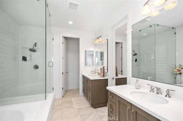11 Juniper, Lake Forest, CA 92630 - bathroom with a stall shower, two vanities, a bath, recessed lighting, and marble finish floors