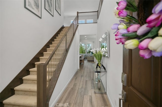 11 Juniper, Lake Forest, CA 92630 - staircase featuring wood finished floors and baseboards