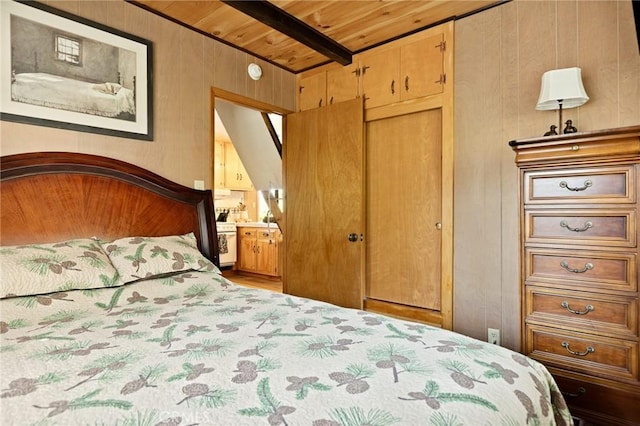 32953 Juniper Ln, Green Valley Lake, CA 92341 - bedroom with a wooden ceiling with exposed beams, wooden walls, and wood finished floors