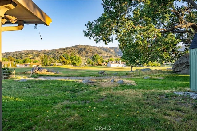 24050 Basin Harbor Ct, Tehachapi, CA 93561 - view of grassy yard featuring a mountain view