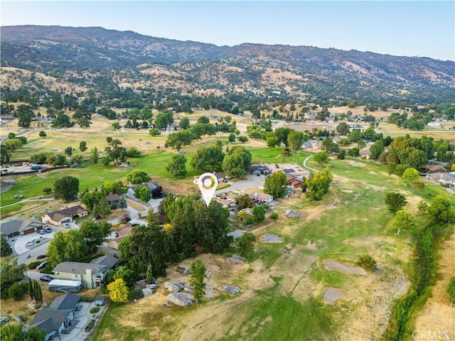 24050 Basin Harbor Ct, Tehachapi, CA 93561 - aerial overview of property's location featuring mountains and nearby suburban area