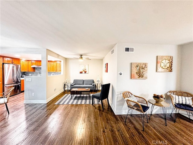 18602 Creek Ln, Huntington Beach, CA 92648 - living room featuring dark wood-style flooring and a ceiling fan