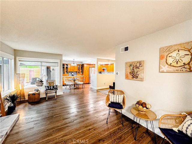 18602 Creek Ln, Huntington Beach, CA 92648 - living room with dark wood-style floors and baseboards