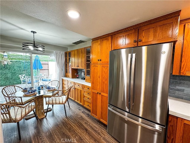 18602 Creek Ln, Huntington Beach, CA 92648 - kitchen featuring freestanding refrigerator, brown cabinets, light countertops, and recessed lighting