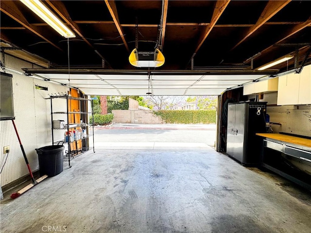 18602 Creek Ln, Huntington Beach, CA 92648 - garage featuring a garage door opener