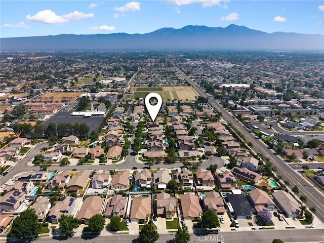 12975 Cambridge Ct, Chino, CA 91710 - aerial view of property and surrounding area featuring a mountainous background and nearby suburban area