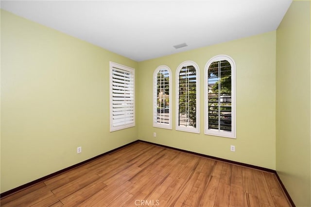 12975 Cambridge Ct, Chino, CA 91710 - unfurnished room with light wood finished floors and baseboards