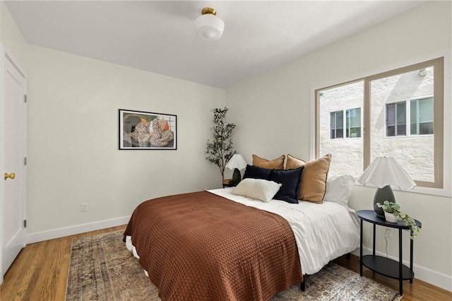 4131 Edgehill Dr, Los Angeles, CA 90008 - bedroom featuring light wood finished floors