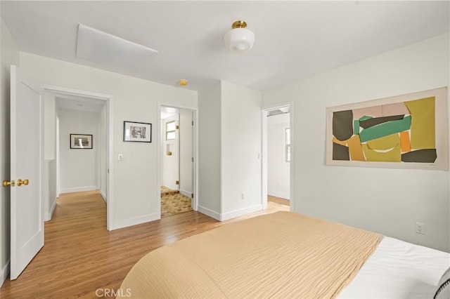 4131 Edgehill Dr, Los Angeles, CA 90008 - bedroom featuring wood finished floors and baseboards